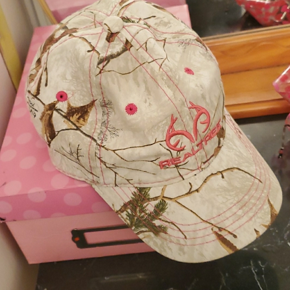 A Realtree brand pink and brown camo hat